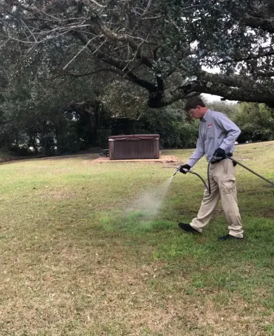 tech spraying pesticide